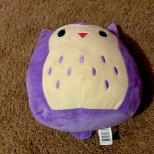 This is a purple owl squishmellow who is looking for a new owner!!!